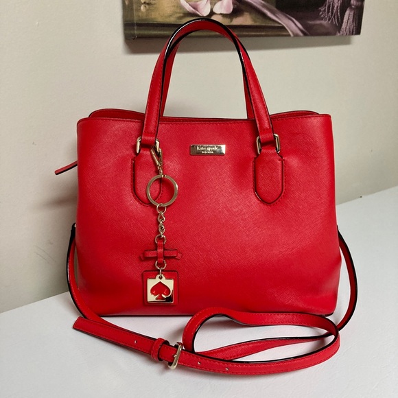 kate spade Handbags - Kate Spade bright red satchel bag with keychain